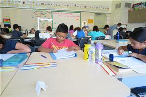 Students working on assignments in class. 