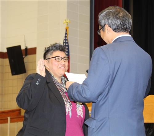 WCCUSD Board President Valerie Cuevas is sworn in for a second term by El Cerrito Mayor Gabriel Quinto. 