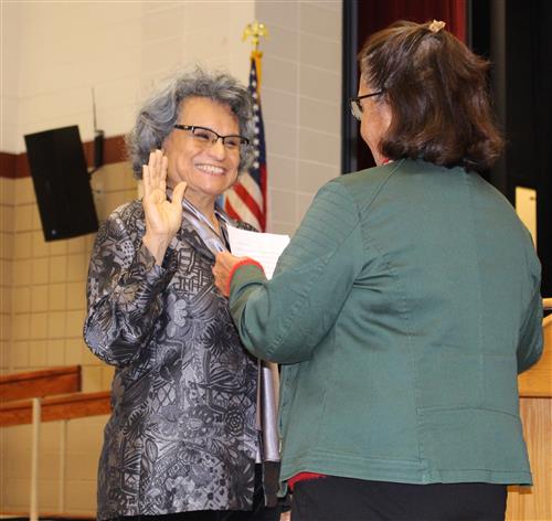 Newly-elected School Board Member Consuelo Lara is sworn in by San Pablo Mayor Genoveva Calloway 